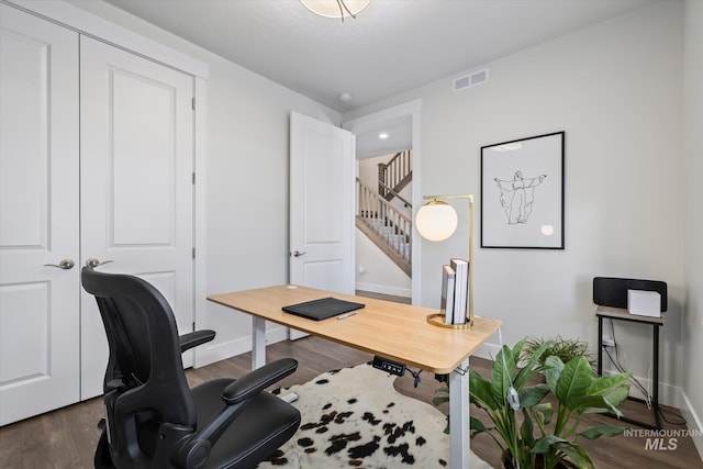 6086 S Sachet Ave, Meridian, ID 83642 - office area with visible vents, dark wood-style flooring, and baseboards