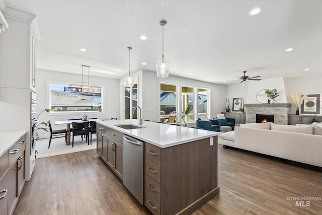 6086 S Sachet Ave, Meridian, ID 83642 - kitchen with ceiling fan, a sink, light countertops, recessed lighting, and a wealth of natural light