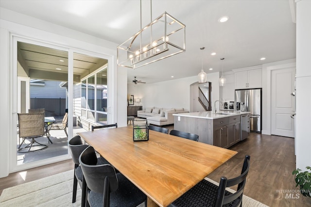 6086 S Sachet Ave, Meridian, ID 83642 - dining area featuring ceiling fan, recessed lighting, and dark wood-type flooring