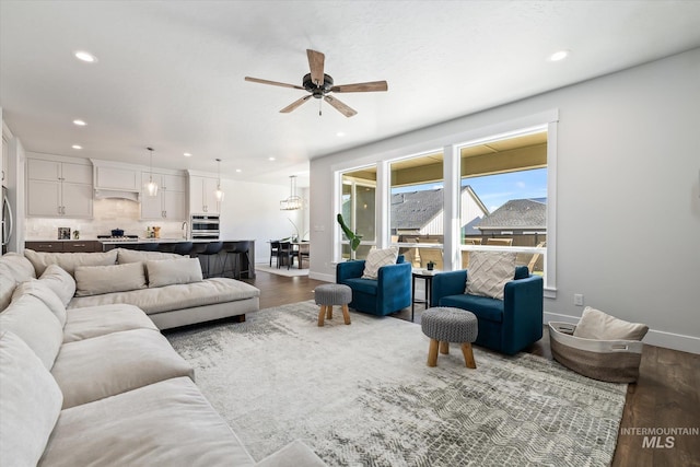 6086 S Sachet Ave, Meridian, ID 83642 - living area featuring recessed lighting, baseboards, ceiling fan, and dark wood-style floors
