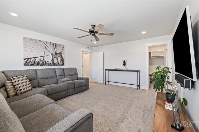 6086 S Sachet Ave, Meridian, ID 83642 - carpeted living room with a ceiling fan, recessed lighting, and visible vents