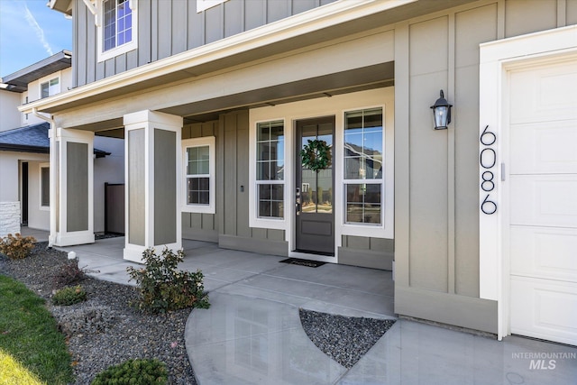 6086 S Sachet Ave, Meridian, ID 83642 - property entrance featuring board and batten siding and covered porch
