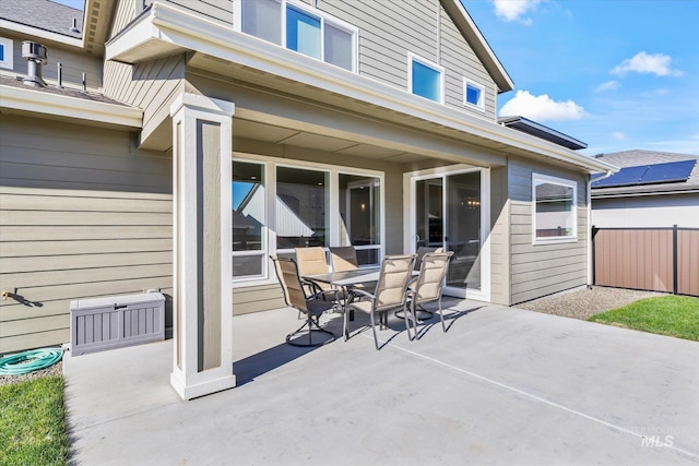6086 S Sachet Ave, Meridian, ID 83642 - view of patio / terrace featuring outdoor dining area and fence