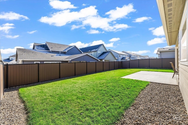 6086 S Sachet Ave, Meridian, ID 83642 - view of yard with a fenced backyard, a patio area, and a residential view
