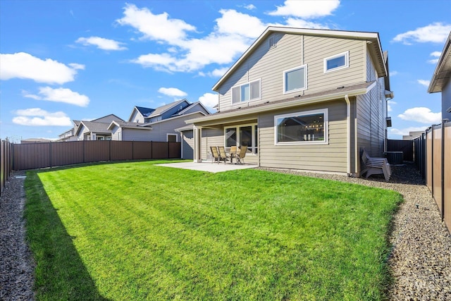 6086 S Sachet Ave, Meridian, ID 83642 - rear view of property featuring a fenced backyard, a patio, a yard, and cooling unit