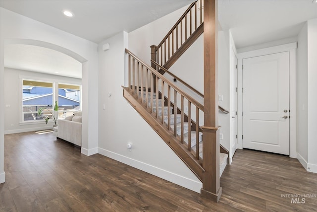 6086 S Sachet Ave, Meridian, ID 83642 - stairs with recessed lighting, baseboards, arched walkways, and wood finished floors
