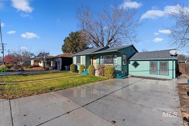 ranch-style house with a front lawn