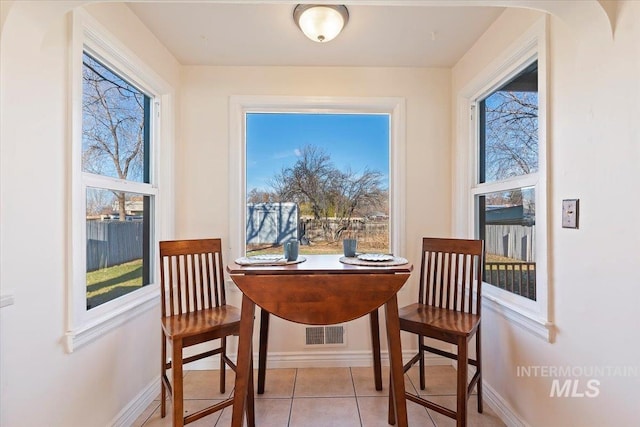 view of tiled dining room