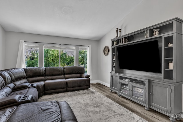 8466 W Idaho Blvd, Letha, ID 83636 - living area featuring vaulted ceiling, wood finished floors, and baseboards