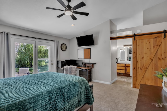 8466 W Idaho Blvd, Letha, ID 83636 - bedroom with a barn door, vaulted ceiling, access to outside, light carpet, and baseboards
