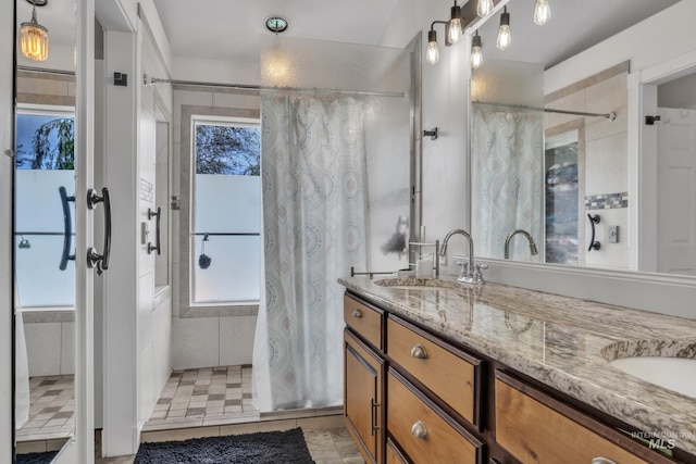 8466 W Idaho Blvd, Letha, ID 83636 - full bath featuring healthy amount of natural light, tiled shower, and double vanity
