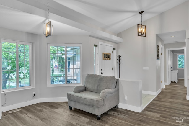 8466 W Idaho Blvd, Letha, ID 83636 - sitting room with a chandelier, wood finished floors, baseboards, and vaulted ceiling