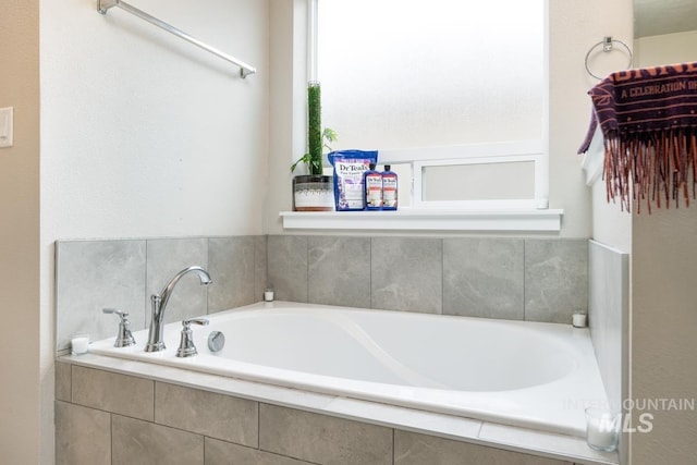 full bath with a garden tub
