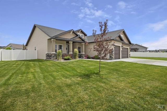 1010 Blueridge Dr, Kimberly, ID 83341 - craftsman-style house with driveway, a garage, and stone siding