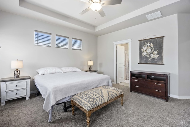 1010 Blueridge Dr, Kimberly, ID 83341 - carpeted bedroom with a tray ceiling and a ceiling fan