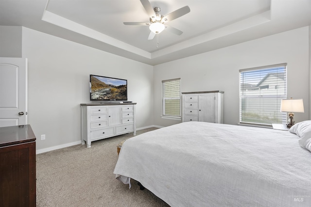 1010 Blueridge Dr, Kimberly, ID 83341 - bedroom featuring a raised ceiling, light carpet, and ceiling fan