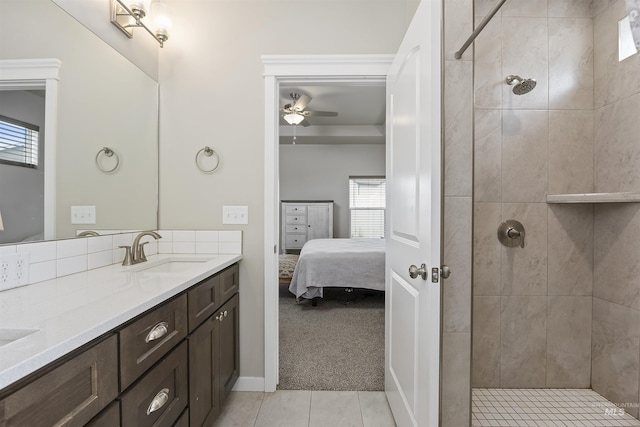 1010 Blueridge Dr, Kimberly, ID 83341 - full bath featuring ensuite bathroom, double vanity, tile patterned flooring, tiled shower, and ceiling fan