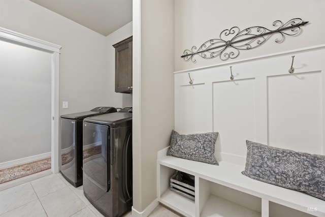 1010 Blueridge Dr, Kimberly, ID 83341 - washroom with cabinet space, separate washer and dryer, and light tile patterned floors