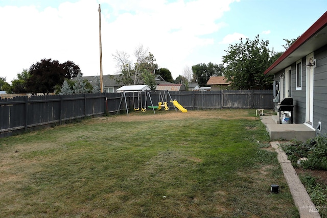 view of yard with a playground