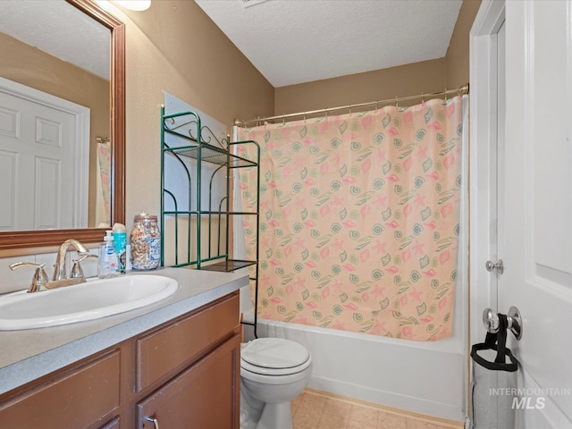 bathroom featuring toilet, a textured ceiling, shower / bathtub combination with curtain, and vanity