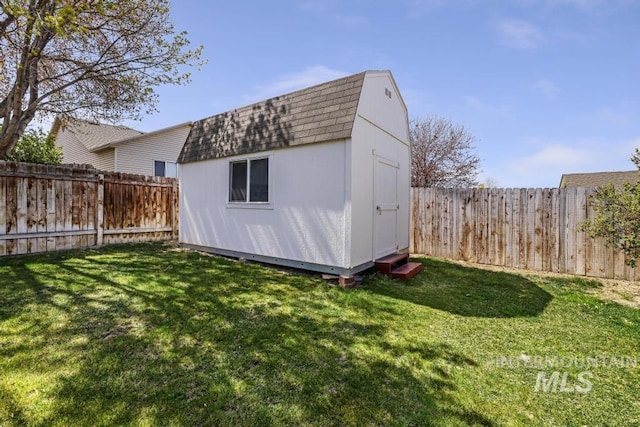 view of shed featuring a fenced backyard
