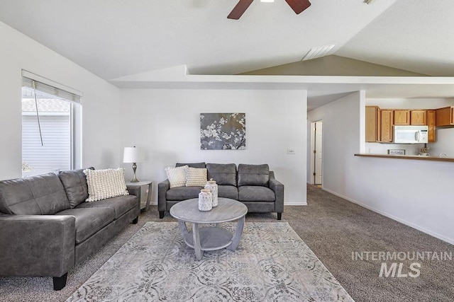 living room with vaulted ceiling, ceiling fan, carpet, baseboards, and visible vents