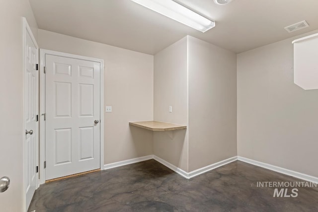 7362 S Shadowmoss Ave, Boise, ID 83709 - interior space featuring concrete flooring and baseboards