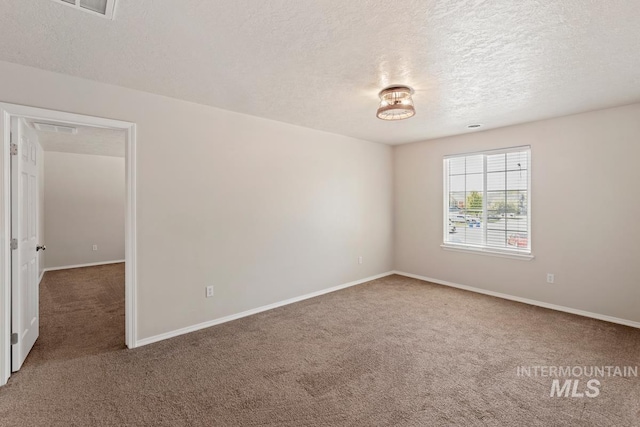 7362 S Shadowmoss Ave, Boise, ID 83709 - carpeted empty room with a textured ceiling and baseboards
