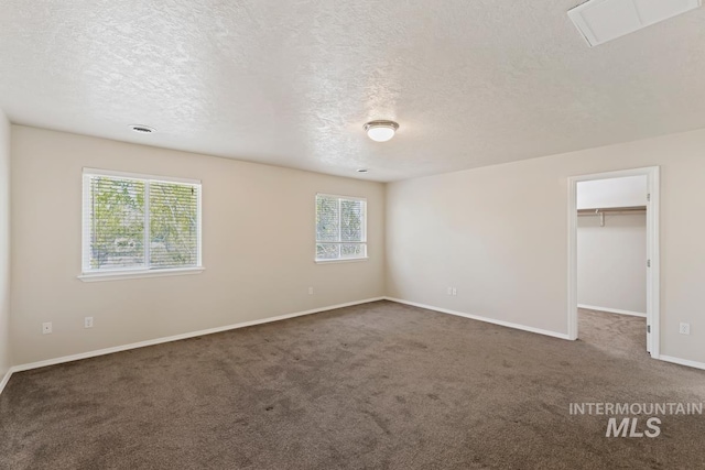 7362 S Shadowmoss Ave, Boise, ID 83709 - carpeted spare room featuring a textured ceiling, plenty of natural light, and baseboards