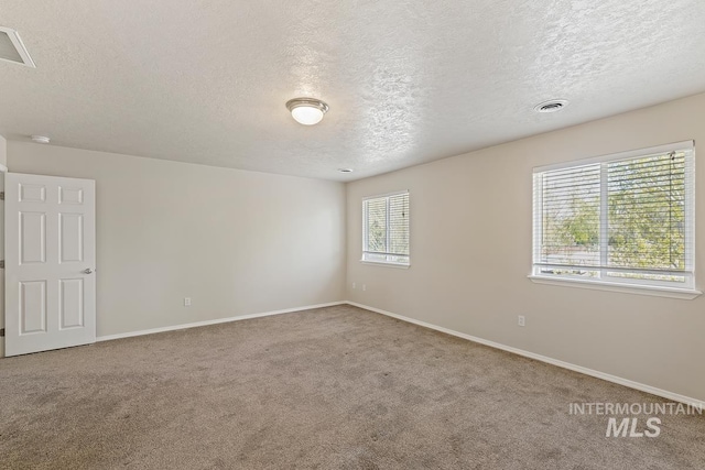 7362 S Shadowmoss Ave, Boise, ID 83709 - carpeted empty room with a textured ceiling and baseboards