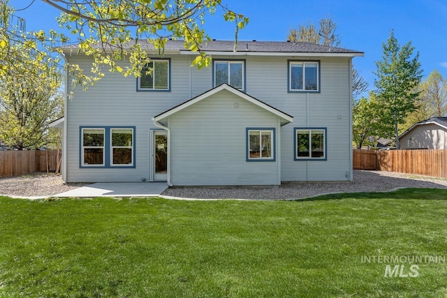 7362 S Shadowmoss Ave, Boise, ID 83709 - back of property with a patio area