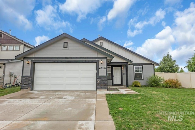 view of front of property with board and batten siding, a garage, concrete driveway, and stone siding