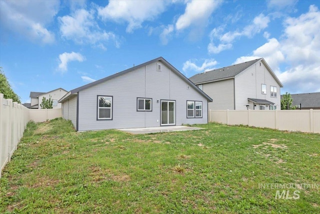 back of house with a patio area