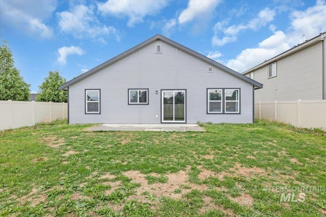 back of house with a patio area