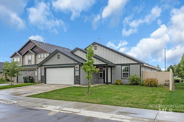view of front of house with a garage, concrete driveway, and board and batten siding