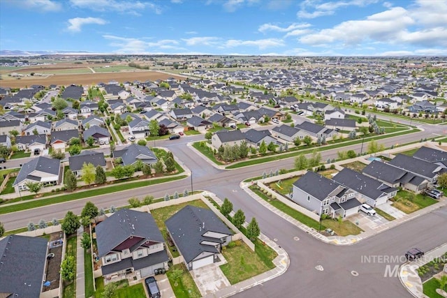 aerial view of property's location featuring nearby suburban area