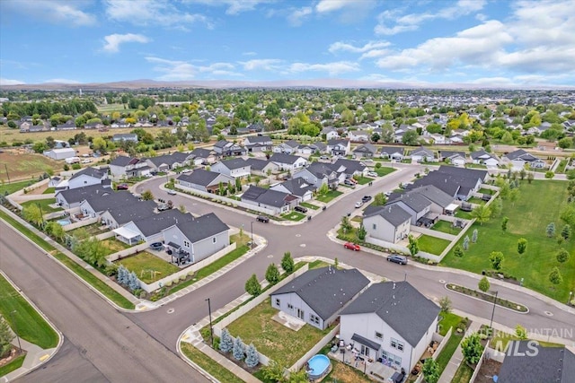 aerial view of property's location with nearby suburban area