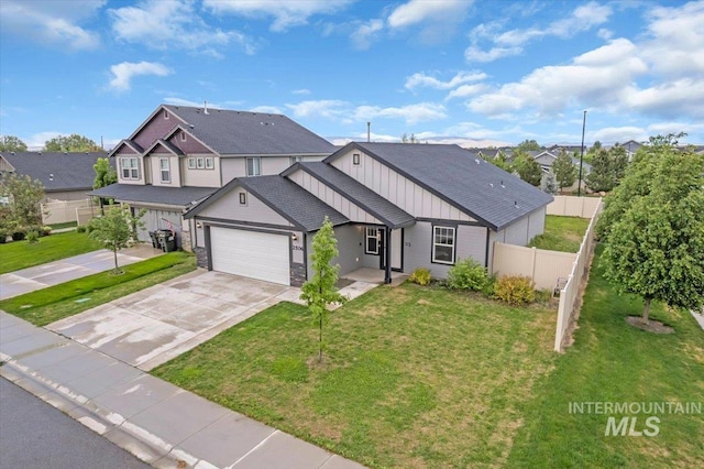 view of front of property featuring board and batten siding, an attached garage, concrete driveway, and a residential view