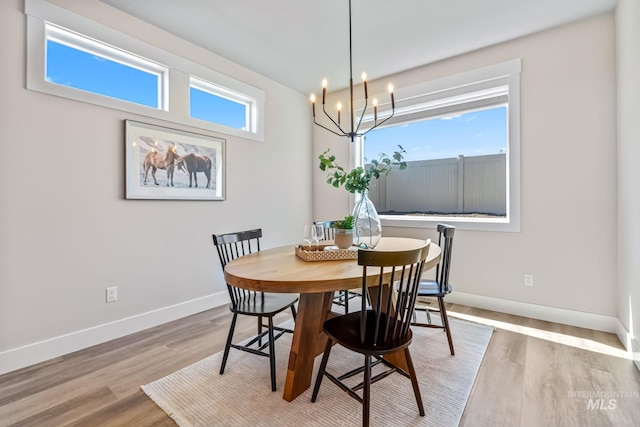 1501 E Andes Dr, Kuna, ID 83634 - dining space featuring a chandelier and light wood finished floors