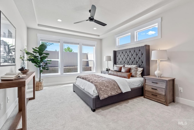 1501 E Andes Dr, Kuna, ID 83634 - bedroom featuring a tray ceiling, light carpet, recessed lighting, and ceiling fan