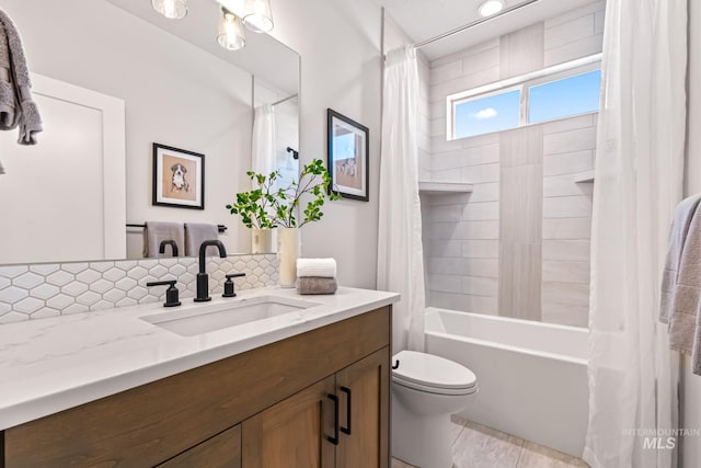1501 E Andes Dr, Kuna, ID 83634 - full bathroom featuring vanity, shower / bath combo, and decorative backsplash