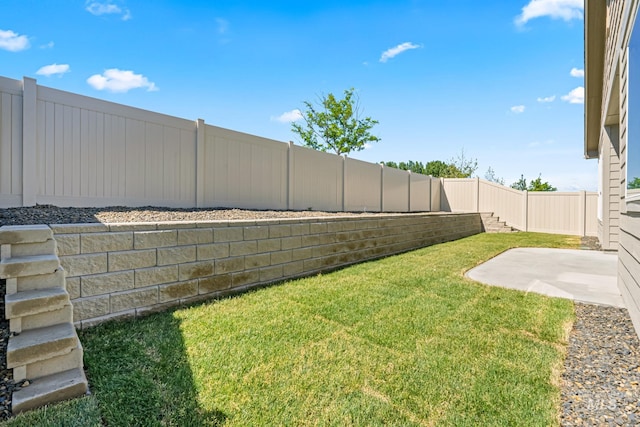 1501 E Andes Dr, Kuna, ID 83634 - fenced backyard featuring a patio area