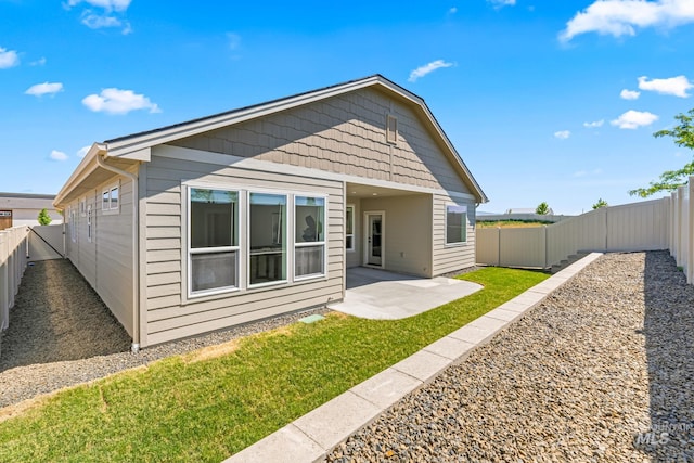 1501 E Andes Dr, Kuna, ID 83634 - back of house featuring a patio area and a fenced backyard