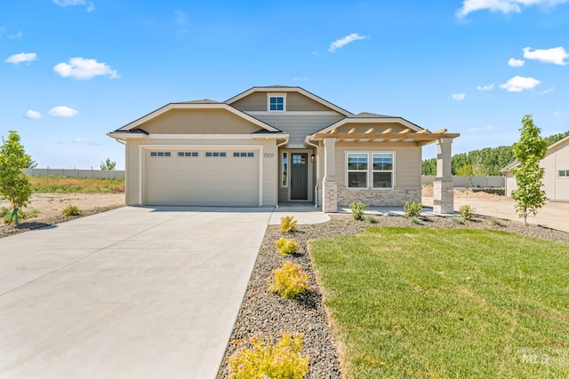 1501 E Andes Dr, Kuna, ID 83634 - view of front facade with an attached garage, driveway, and a front yard