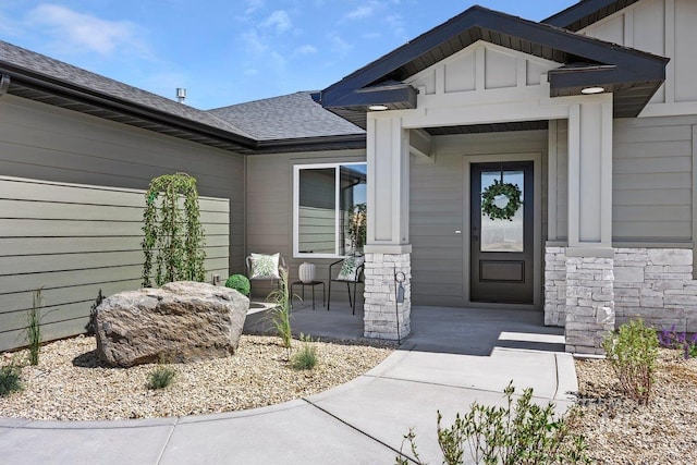 958 Gregory Way, Twin Falls, ID 83301 - view of exterior entry featuring a shingled roof and stone siding