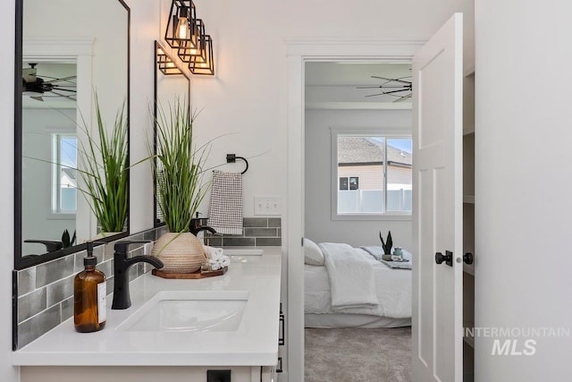 958 Gregory Way, Twin Falls, ID 83301 - bathroom featuring ensuite bathroom, double vanity, and ceiling fan