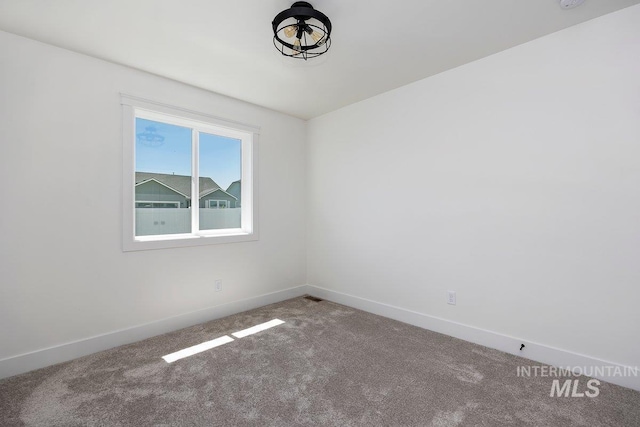 958 Gregory Way, Twin Falls, ID 83301 - carpeted empty room featuring baseboards