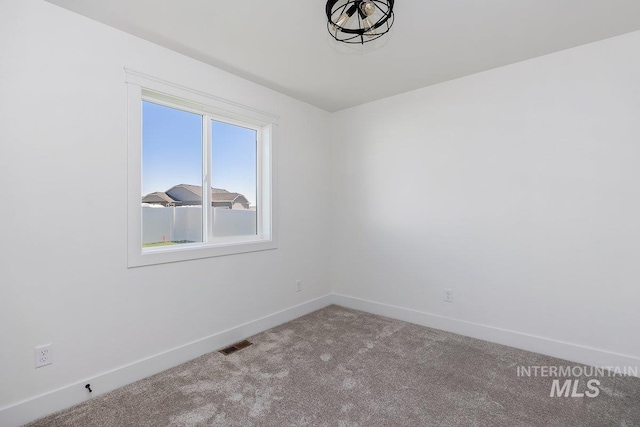 958 Gregory Way, Twin Falls, ID 83301 - carpeted empty room with baseboards