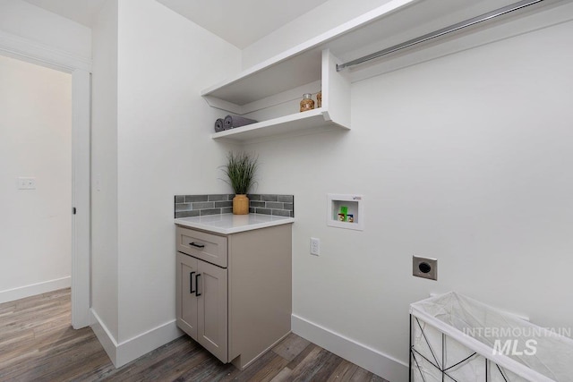 958 Gregory Way, Twin Falls, ID 83301 - laundry room with hookup for an electric dryer, hookup for a washing machine, dark wood-style floors, and baseboards