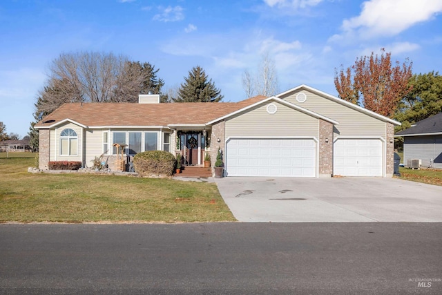 single story home with a front lawn and a garage